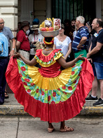Dressed women selling fruits in Cartagena